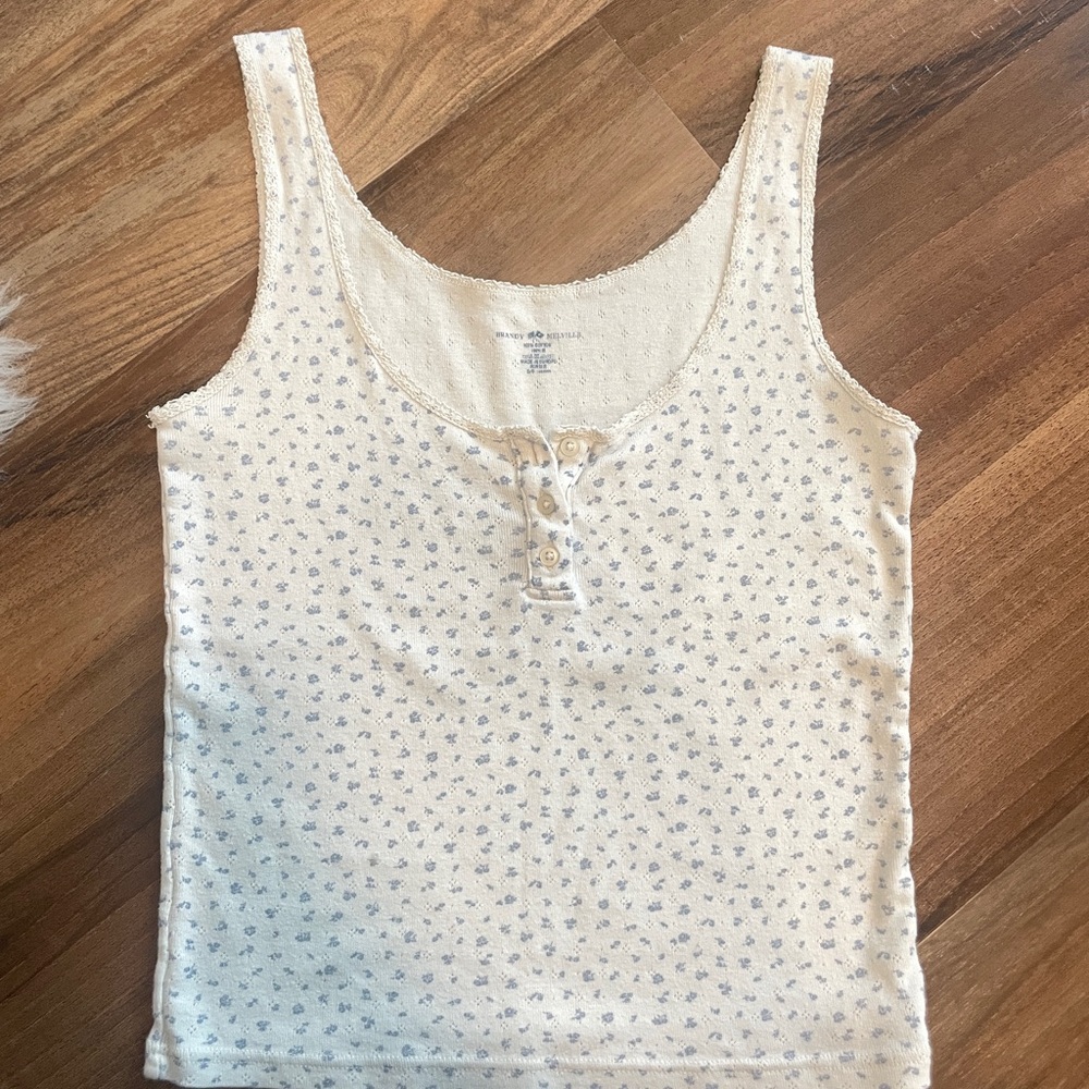 Brandy Melville Cream Tank Top with Blue Floral Design